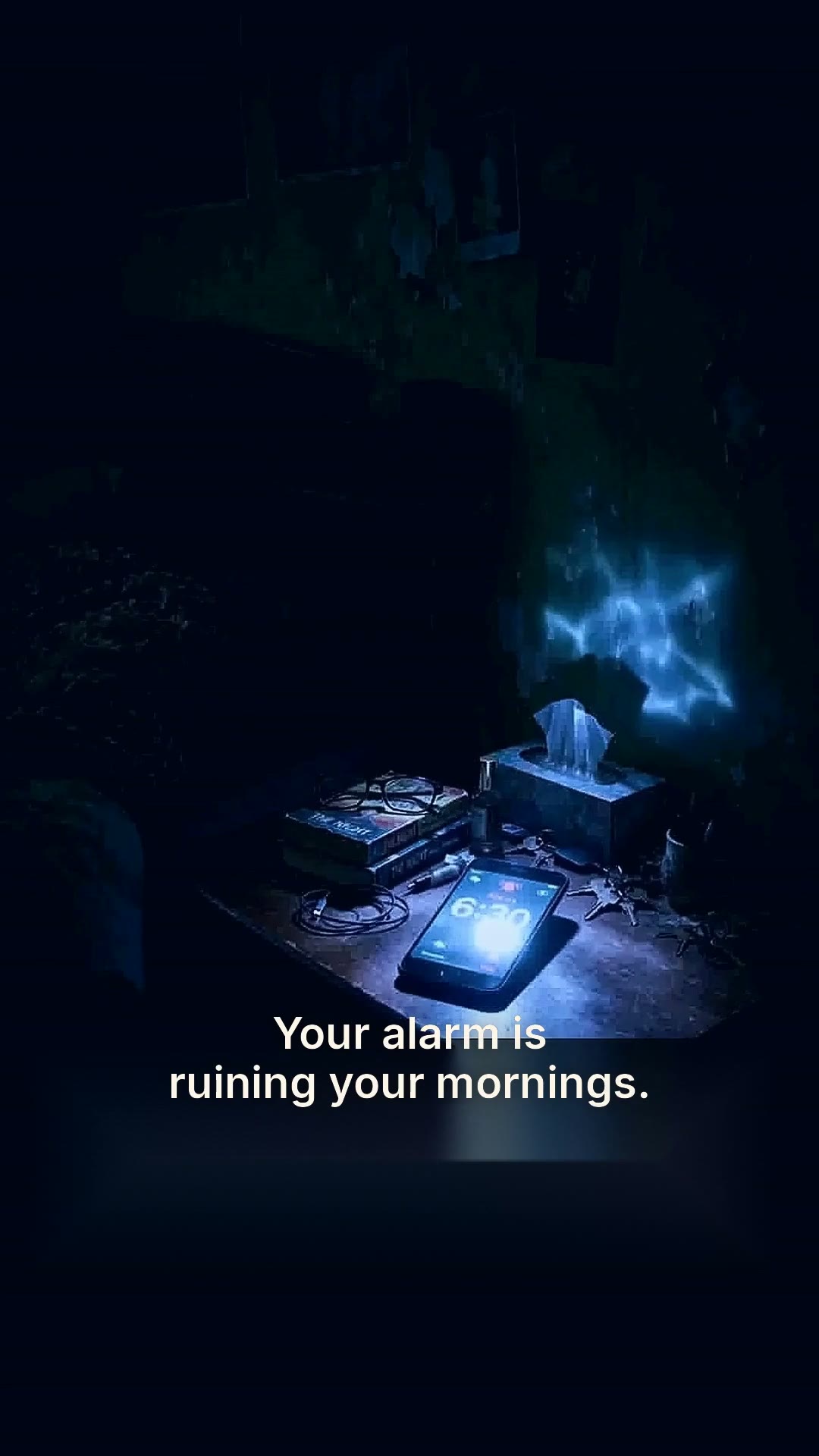 The sunrise alarm clock gradually brightening beside a bed