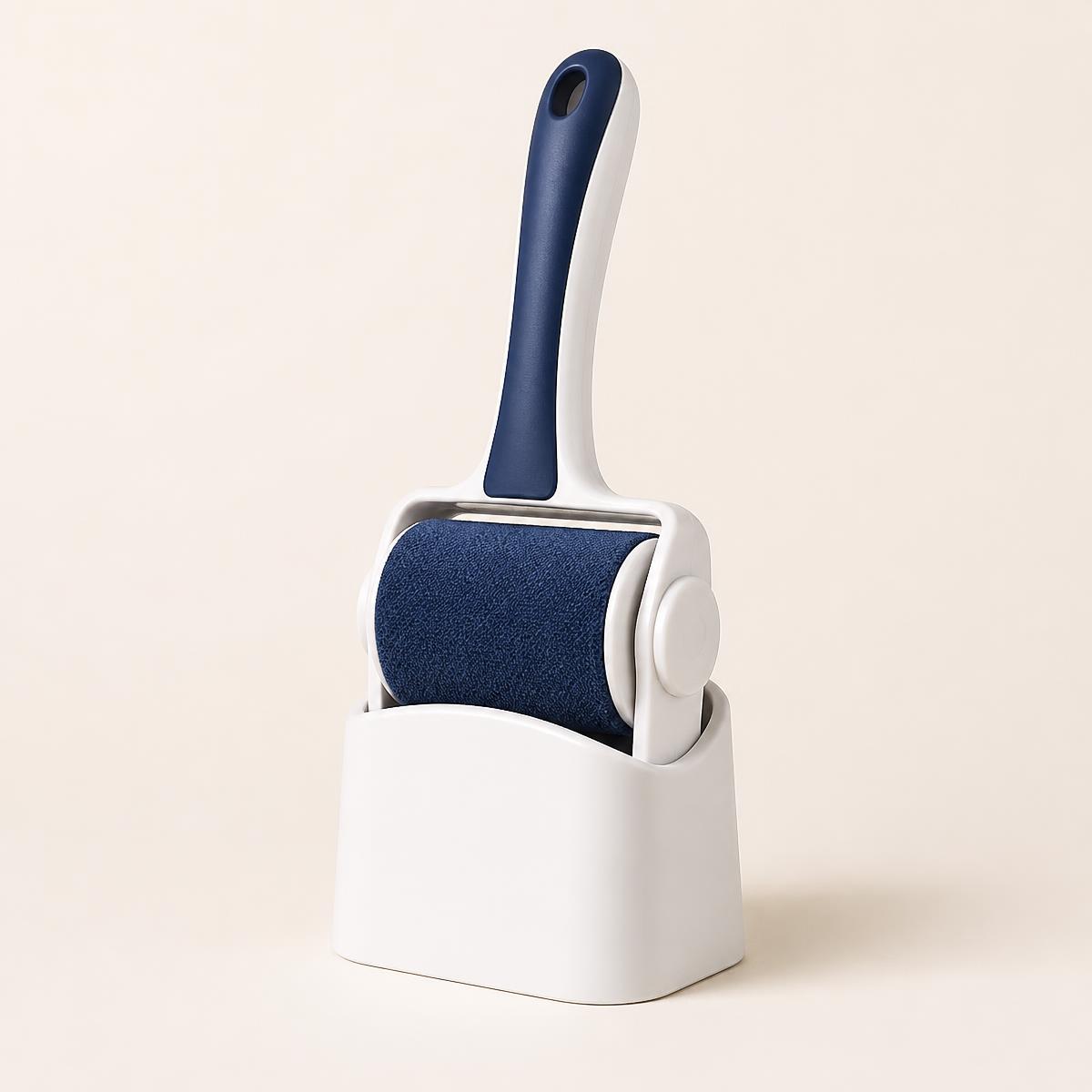 White and blue reusable pet hair remover roller standing in its self-cleaning base